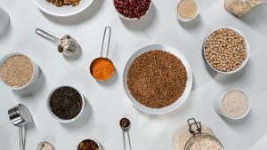 Assorted Ingredients in Bowls, Jars and Measuring Cups