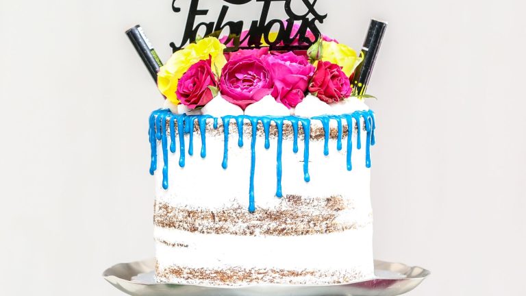 Baked Cake on Gray Cake Stand on Glass Table