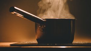 Black Cooking Pot and Smoke in Close-up Photography