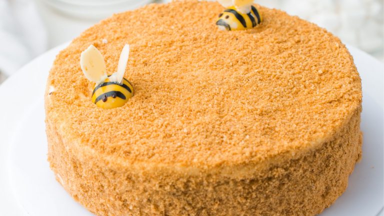 Brown Cake With Bees Decorations