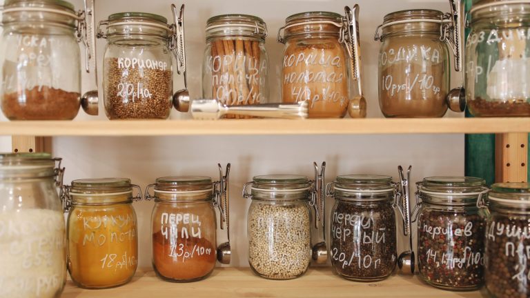 Glass Jars on Wooden Shelf