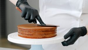 Person Baking a Cake