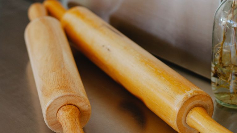 Wooden Rolling Pins on a Stainless Surface