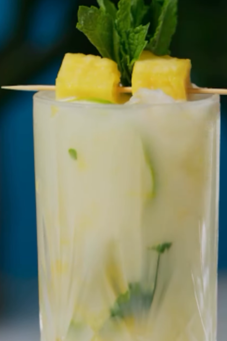 Pineapple Coconut Mojito Recipe #mojito #pineapplecoconutmojito #tropicaldrink #cocktail #refreshingdrink #summerdrinks #easyrecipes #homemadecocktails #mint #pineapple #coconutwater #rum #delicious #drinksathome #tropicalvibes #drinkrecipe #yum #foodie